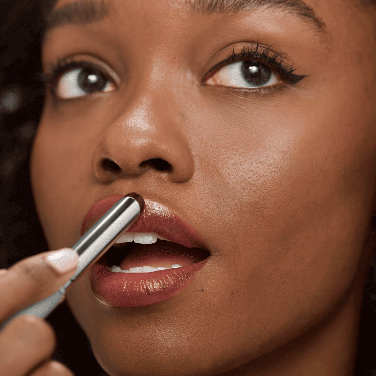 Honey-colored lipstick + mascara