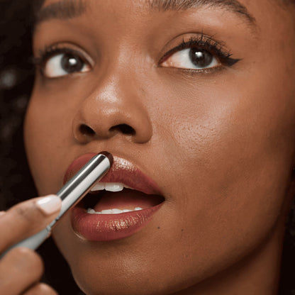 Honey-colored lipstick + mascara